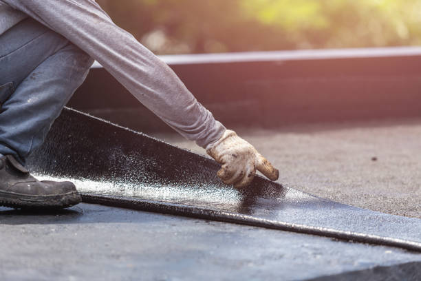 Professional Waterproofing technician working in Bristow, VA